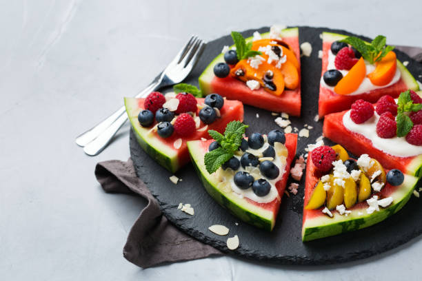 istock Watermelon pizza with berries, fruit, yogurt, feta cheese 1389619324