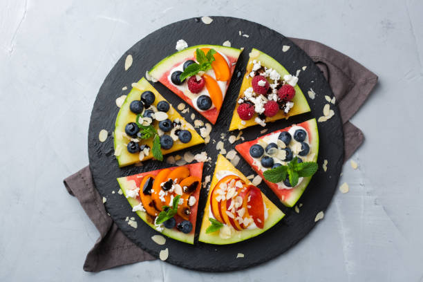 istock Watermelon pizza with berries, fruit, yogurt, feta cheese 1389619485