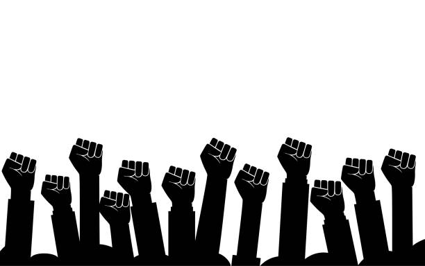 Group of fists raised in air. Group of protestors fists raised up in the air vector illustration Group of fists raised in air. Group of protestors fists raised up in the air vector illustration angry crowd stock illustrations