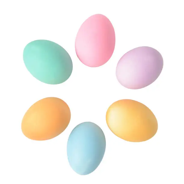 Pastel Easter eggs isolated on white background, top view