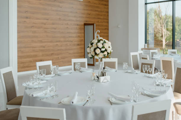 istock Artificial flowers decoration on a wedding reception 1389623065