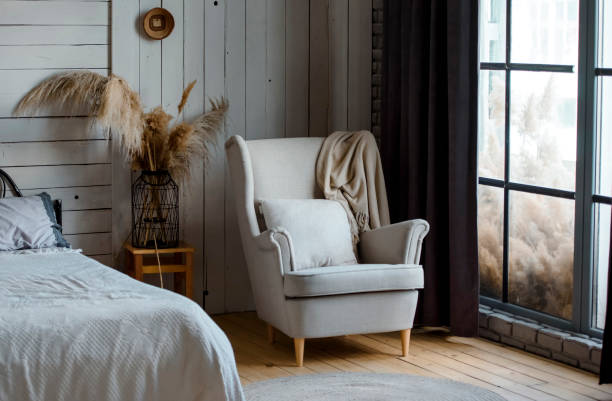 istock vintage armchair near a window. 1389628793