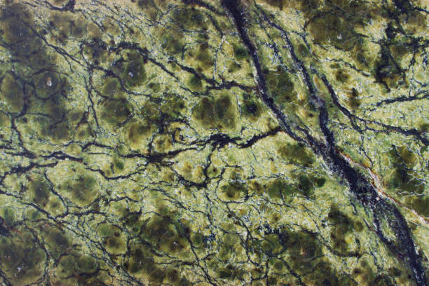 Natural background made of serpentine stone.