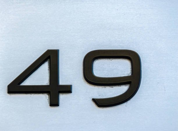 istock Metal home number on a wall 1389631238
