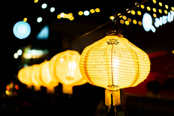 istock A row of yellow lanterns at night 1389635382