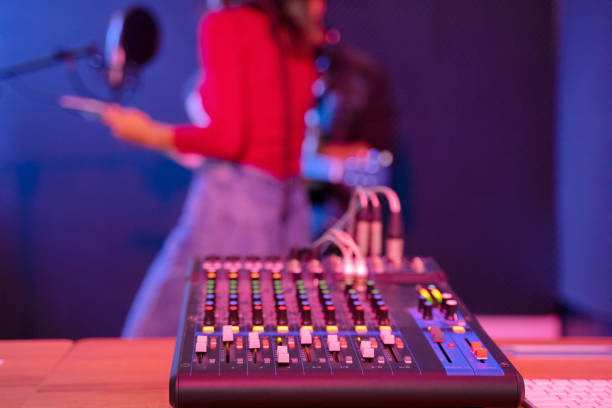 istock Leisure activity of young musician. Sing a song in studio. 1389640150