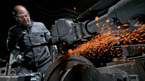 istock Male worker grinding product 1389640461