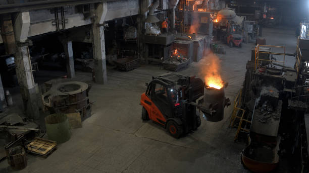 istock Carrying molten metal in forklift 1389640493