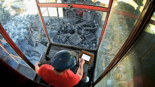Montevideo, Uruguay - October 10, 2021: Worker inside cabin at container loading zone at montevideo port, uruguay