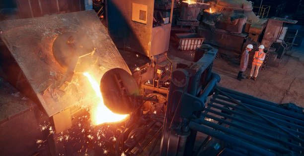 istock Engineers talking in steel mill 1389640505