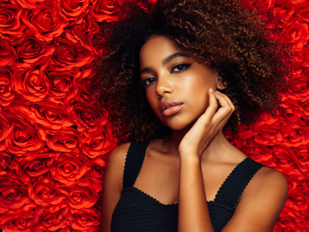 istock Beautiful afro woman 1389641436