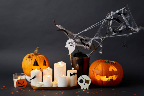 istock pumpkins, candles and halloween decorations 1389642770