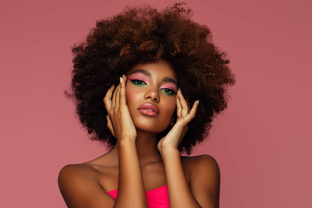 istock Beautiful afro woman with bright make-up 1389643021