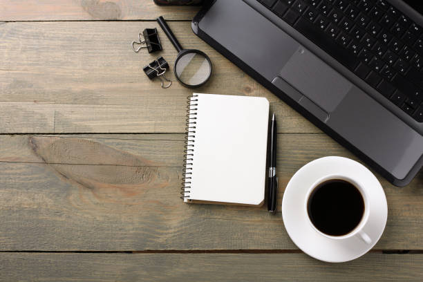 istock Laptop and office supplies 1389646696