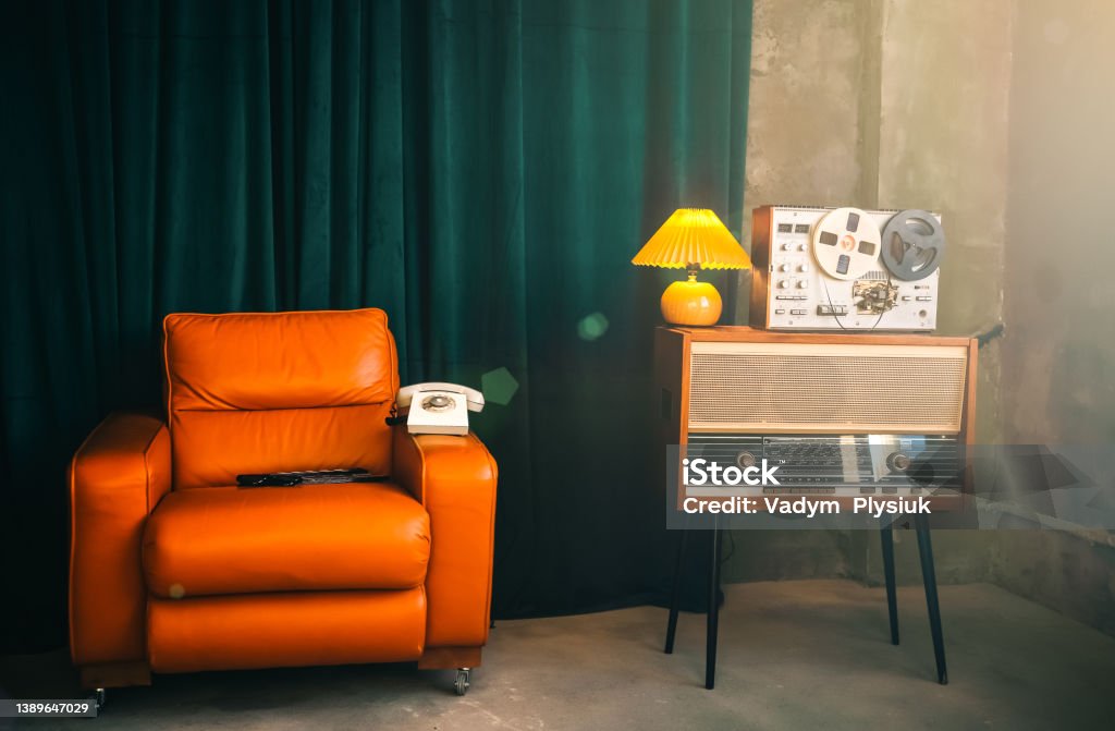 Vintage room with Wiretapping on the reel tape recorder. Retro old school spying on conversations. Intelligence gathering. Espionage concept. Former Soviet Union Stock Photo