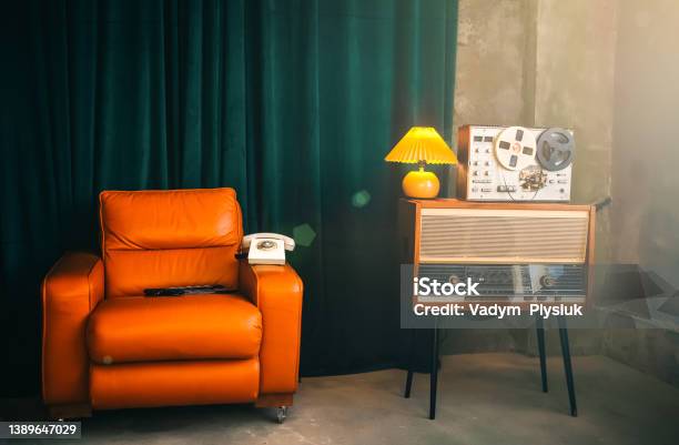 Vintage Room With Wiretapping On The Reel Tape Recorder Retro Old School Spying On Conversations Intelligence Gathering Espionage Concept Stock Photo - Download Image Now