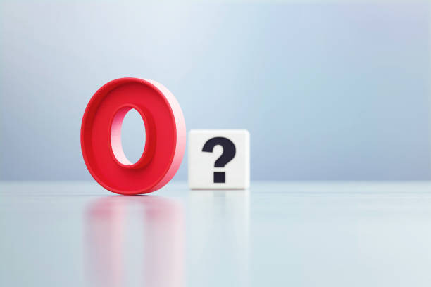 istock Red Number 0 And Question Mark Written White Cube Sitting Before Defocused  Background 1389647347