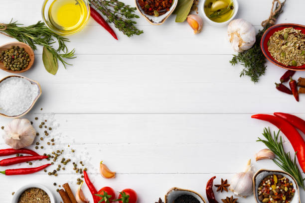 istock Olive oil and spices on kitchen table 1389647451