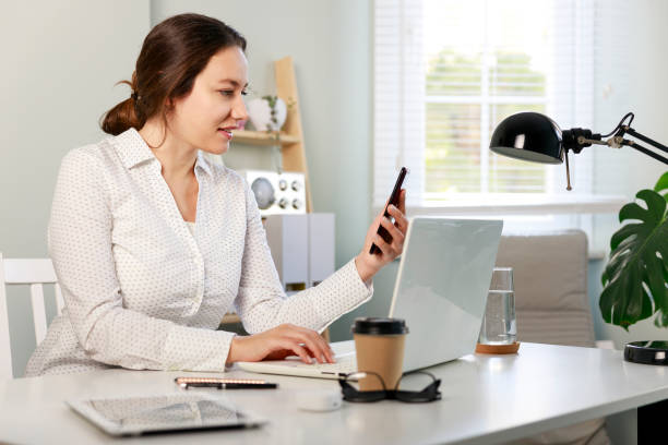 istock Young woman working at home 1389648078