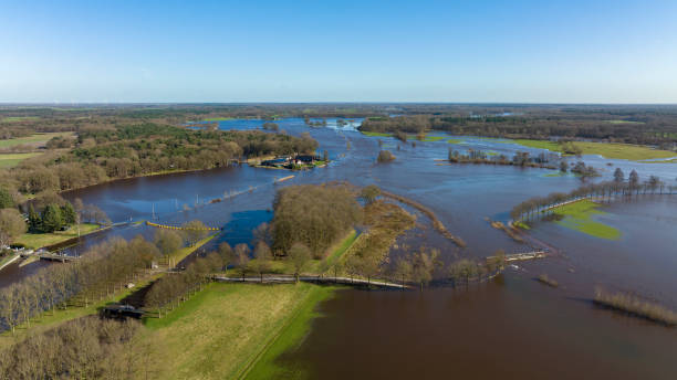 istock Vecht river high water level flooding at the Vilsteren weir drone view 1389649892