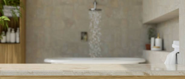 istock Empty space on marble bathroom countertop against blurred luxury elegance bathroom 1389649966