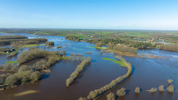 istock Vecht river high water level flooding at the Vilsteren weir drone view 1389650087