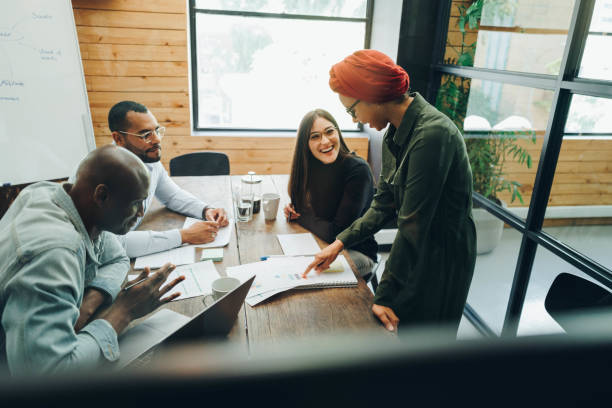 istock Diverse business team brainstorming in a creative office 1389653273