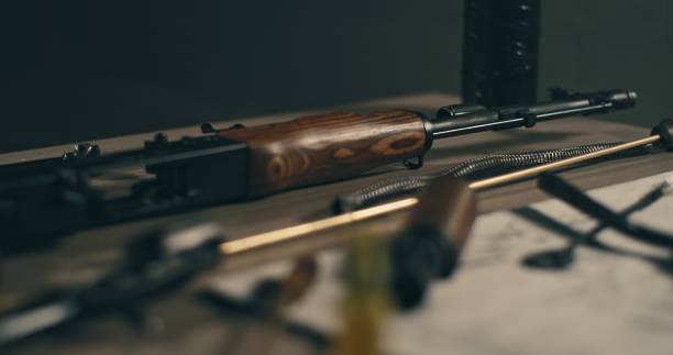 istock AK-47 gun and cleaning accessories on a table. Ready to use 1389654902