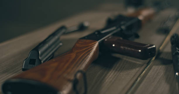 istock AK-47 gun and cleaning accessories on a table. Ready to use 1389654904