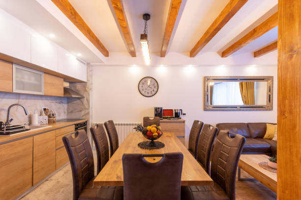 istock Kitchen interior and dining area in modern new mountain apartment 1389654981