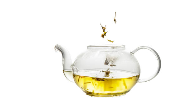 istock herbal tea served in a transparent glass teapot isolated over white backgound ready for breakfast or tea ceremony 1389656162