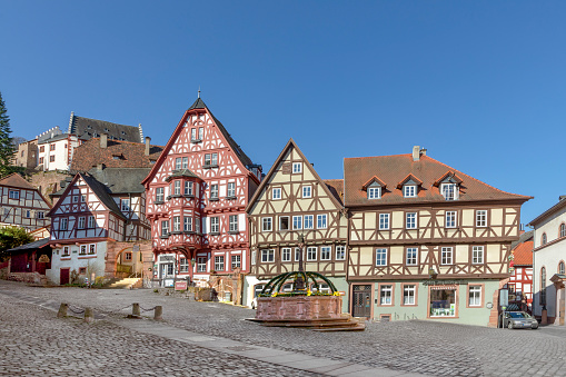 Miltenberg, Germany - April 6, 2018: Half-timbered old house in Miltenberg, Lower Franconia, Bavaria, Germany.