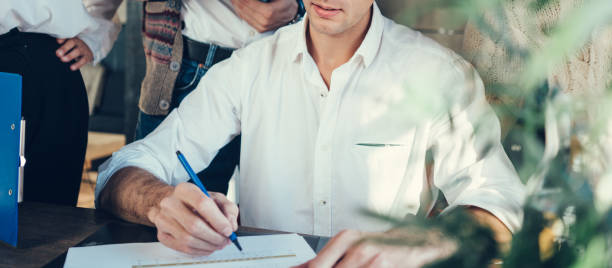 istock Group of business people working with documents 1389658947