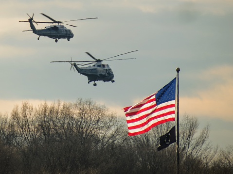 Marine One with American Flag in foreground