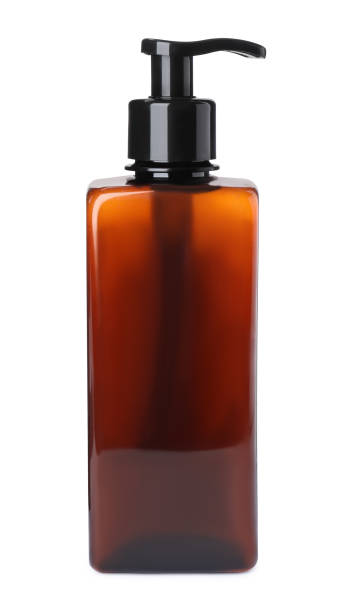 istock Dispenser bottle isolated on white. Men's cosmetics 1389668499