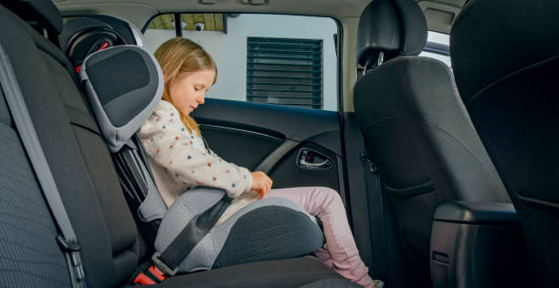 istock Girl sitting in modern car 1389670257