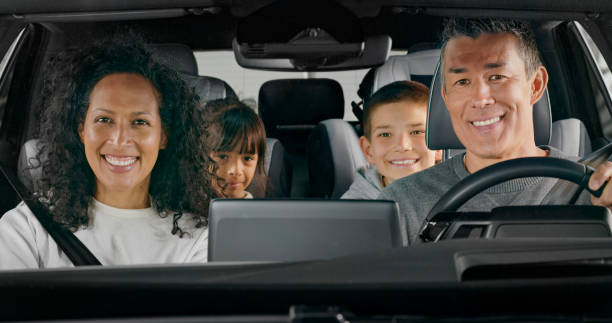 A joyful and happy family is sharing love and delightful moments as they embark on a memorable road trip