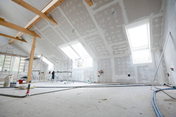 istock Attic finishing in the phase drywall spackling and plastering 1389671785