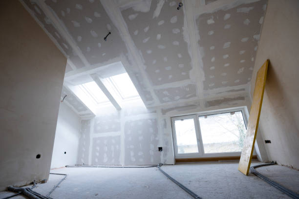 istock Attic finishing in the phase drywall spackling and plastering 1389671946