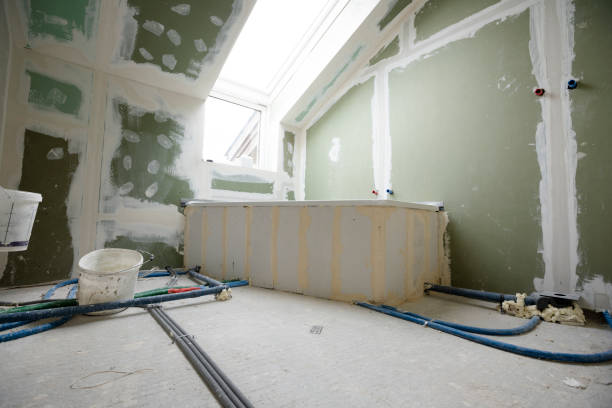 istock Attic finishing in the phase drywall spackling and plastering 1389672596