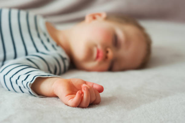 istock Toddler boy sleeping close-up. bedtime 1389674112