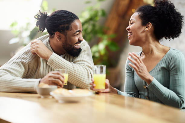 istock Happy black couple talking during morning at home. 1389678240