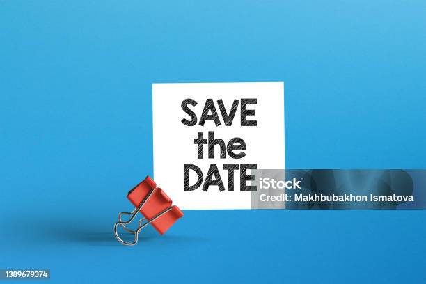 Save The Date Metal Clip With Note Paper And Save The Date Note Stock Photo - Download Image Now
