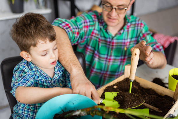 istock Planting is easy with helping hand 1389679997