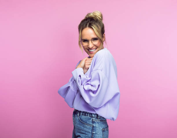 istock Happy woman embracing herself 1389683620