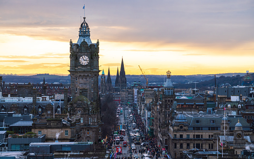 The historic Edinburgh clock tower was taken from Calton Hill at dusk in Edinburgh Scotland United Kingdom