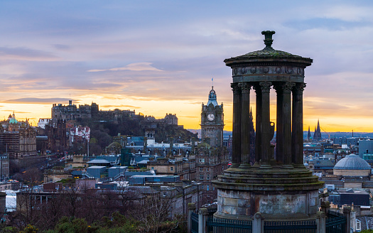 Clock Towner Old town Edinburgh and Edinburgh castle view from The National Monument and Nelson Monument on Calton Hill on a night light twilight be for sunrise landscape of edinburgh, Scotland , UK