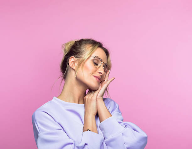 istock Thoughtful woman with eyes closed 1389684587
