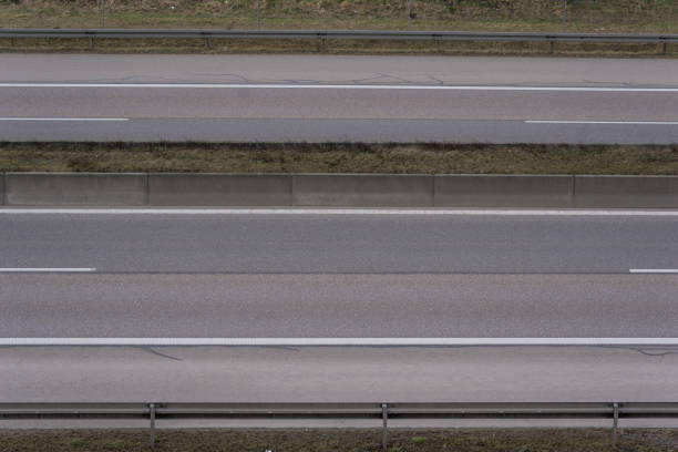 istock cutout of an empty  german motorway, autobahn, with 2 lanes in each direction 1389684813