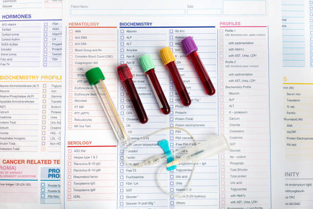 workplace of laboratory with blood tubes samples and requisition form for analysis in the biochemistry laboratory - laboratory science healthcare and medicine centrifuge imagens e fotografias de stock